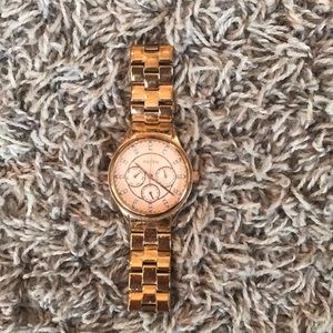 Gold fossil watch